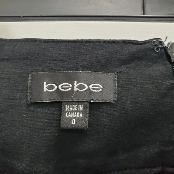 Bebe Women's Black Wool Blend Belted Trumpet Flare Skirt Made‎ in Canada Size 0 - Picture 2 of 4